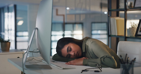 Image showing Burnout, tired and woman sleeping at her desk, office or overworked business employee working with fatigue in workplace. Sleep, rest and exhausted corporate businesswoman at company or worker