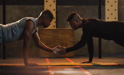 Image showing High five, fitness and men with floor push up at a gym for support, motivation and training goals. Team, handshake and man with personal trainer for weight training, performance and plank workout