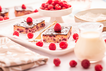 Image showing Traditional buttermilk sheet cake with raspberries and  chocolate ganache