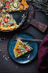 Image showing Delicious vegetarian summer quiche with zucchini, tomato, mushrooms, sage and lavender with phyllo pastry