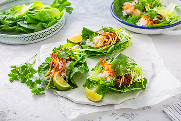 Image showing Asian minced meat lettuce wraps with rice, bean sprouts and cabbage