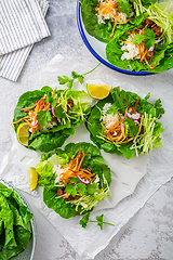 Image showing Asian minced meat lettuce wraps with rice, bean sprouts and cabbage
