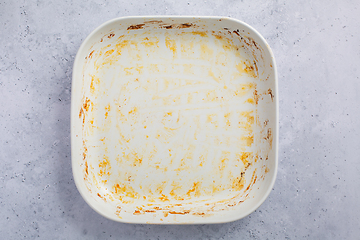 Image showing Baking tray or casserole with burnt on grease