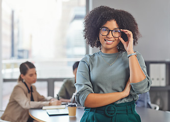 Image showing Leadership, portrait and black woman with arms crossed in office for management, empowerment and ambition. Face, leader and African female manager proud, happy and smile with confidence at startup