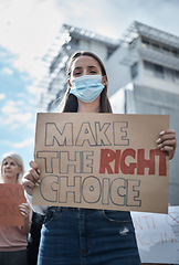 Image showing Protest poster, woman face mask and city portrait with fight, human rights support and rally sign. Urban, group and people with a female person holding a pro vaccine movement signage on a street