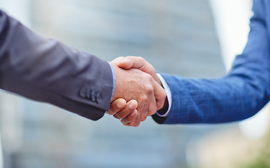 Image showing Handshake, city business men and motivation of staff with success, agreement and partnership. Team work, collaboration and deal of businessman with a greeting and welcome hand gesture with partner