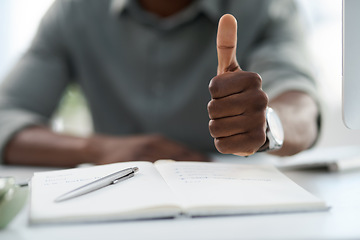 Image showing Man, hands and notebook with thumbs up for winning, achievement or good job on office desk. Hand of male person with book in planning showing thumb emoji, yes sign or like for approval at workplace