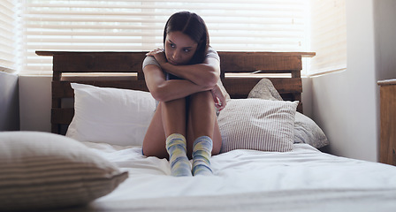 Image showing Depression, stress and woman in a bed thinking of problem, sad or mental health in her home. Anxiety, fear and female person with ptsd, grief or broken heart, lonely and paranoid in a bedroom