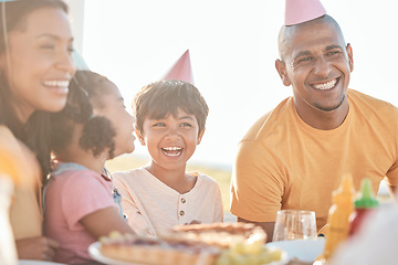 Image showing Birthday, park and happy parents with children in park for event, celebration and party outdoors together. Family, social gathering and mother, father with kids at picnic with cake, presents and food