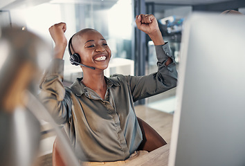 Image showing Success, African woman with celebration and headset at modern workplace office. Telemarketing or customer service, online communication or consulting and call center agent happy for support or crm