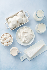 Image showing Assortment of milk products - buttermilk, kefir, yogurt with probiotics, ayran, cheese,  mozzarella, quark and cream.