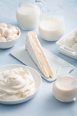 Image showing Assortment of milk products - buttermilk, kefir, yogurt with probiotics, ayran, cheese,  mozzarella, quark and cream.