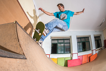 Image showing Skateboarder performing a trick