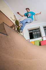 Image showing Skateboarder performing a trick