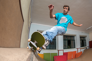 Image showing Skateboarder performing a trick