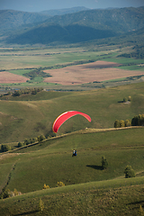 Image showing Paragliding in mountains