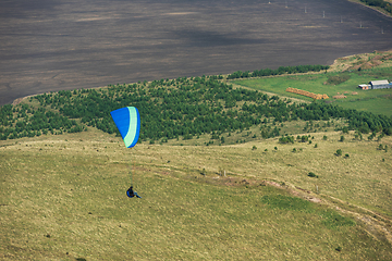 Image showing Paragliding in mountains