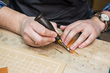 Image showing Concept of handmade craft production of leather goods.