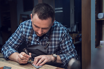 Image showing Concept of handmade craft production of leather goods.