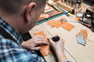 Image showing Concept of handmade craft production of leather goods.