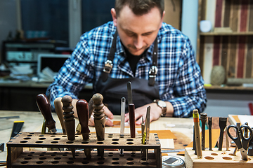 Image showing Concept of handmade craft production of leather goods.