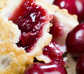 Image showing cherry jam in a crispy bun