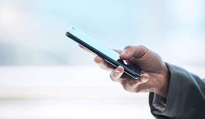 Image showing Phone, hand and networking with a business person typing a text message or email on a blurred background. Mobile, contact and communication with an employee browsing social media or texting closeup