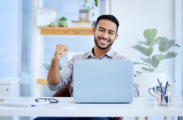 Image showing Laptop, business and a man celebrate success or win at desk with fist for bonus deal or growth. Excited Asian businessman with tech for sales profit, competition or online achievement notification