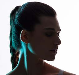 Image showing Beauty, neon and silhouette with profile of woman in studio for creative, glow and lighting mockup space. Fantasy, shadow and shine with model on white background for art, disco and dark aesthetic