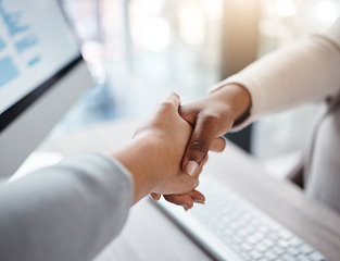 Image showing Thank you, businesspeople shaking hands and at desk of a modern workplace office. Partnership or interview, agreement or welcome and coworkers with a handshake for agreement or congratulations