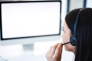 Image showing Woman, call center and consulting with mockup screen in customer service, support or telemarketing at office. Female person, consultant or agent talking with headphones and mock up space at workplace
