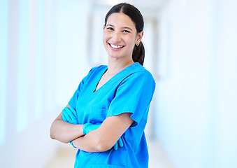 Image showing Woman, nurse smile and portrait with arms crossed and job in a hospital and clinic. Employee, healthcare and wellness professional with happiness and confidence from doctor and medical work and care