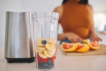 Image showing Fruit, smoothie and closeup with woman and blender in kitchen for gut health, diet and breakfast. Wellness, detox and nutrition with female person at home for cooking, juice and weight loss milkshake