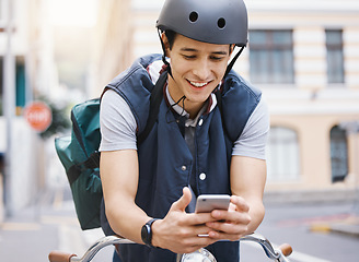 Image showing Man, courier bicycle and smile with phone, order or e commerce app for food, product and sustainable transport. Young guy, bike and metro street with texting, chat and eco friendly with logistics job