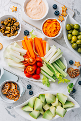 Image showing Crudites platter, raw vegetarian food or party vegetarian platter with various veggie snacks and dips