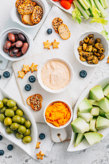 Image showing Crudites platter, raw vegetarian food or party vegetarian platter with various veggie snacks and dips