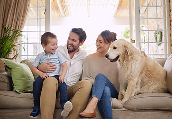 Image showing Family laugh, home and dog with child, mom and dad relax on sofa in living room with love. Pet animal, mother and father with young kid for fun, happiness and care in a house with golden retriever