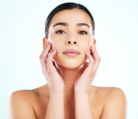 Image showing Face, skincare and confident woman in studio isolated on white background. Portrait, natural beauty and female model with makeup, cosmetics or facial treatment for healthy skin, wellness or aesthetic