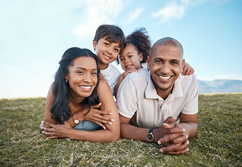 Image showing Family, portrait and relax parents in garden with mother, father and kids together with love. Face, top view and dad with mom and children with parent support and care on a lawn with happy smile