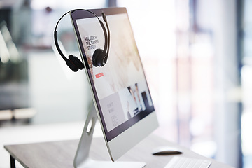 Image showing Headset, call center and computer screen in office for consulting, crm and technology communication or help. Workplace, customer service or telemarketing pc on desktop for work, agency or support