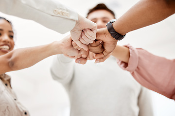 Image showing Fist bump, support and group of people for teamwork, challenge and collaboration, team building game or startup goals. Woman in circle with strong, cooperation and integration hands sign for power