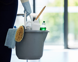 Image showing Hands, cleaner and bucket of supplies for cleaning, hygiene or disinfection at the office. Hand of person, housekeeper or maid holding clean equipment, supply or tools for bacteria or germ removal