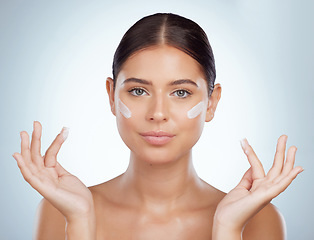 Image showing Skincare, face and beauty of woman with sunscreen in studio isolated on a white background. Portrait, dermatology cream and female model apply cosmetics, lotion or moisturizer product for skin health