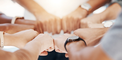 Image showing Group, circle and fist bump with team building closeup, community or collaboration for goals in office. Business people, synergy and productivity with solidarity, agreement or networking in workplace