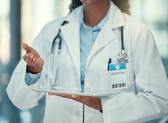 Image showing Closeup, doctor and black woman with a digital tablet, telehealth and connection in a hospital, network and research. Female person, medical professional or employee with technology, app and analysis