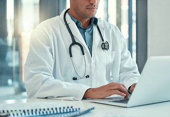 Image showing Laptop, doctor hands and man typing for research, healthcare or telehealth in wellness hospital. Computer, medical professional or person with email, online consultation or writing health information