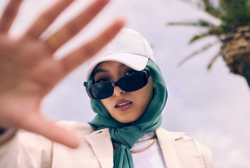 Image showing Muslim woman, fashion selfie and portrait in city, street and gen z aesthetic for beauty, blog and post. Young islamic girl, student and influencer with sunglasses, social media and travel in Dubai