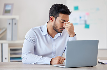 Image showing Businessman, laptop and headache in stress, fail or mistake from depression at office desk. Frustrated and tired asian man by computer with anxiety, debt or bankruptcy in mental health at workplace