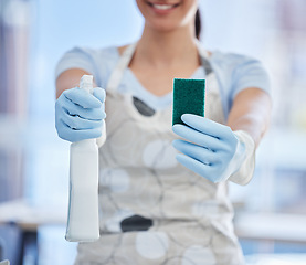 Image showing Hygiene, woman with sponge and bottle with detergents at her home with rubber gloves. Healthcare or germs, clean for bacteria and female person with cleaning equipment for health wellness at house