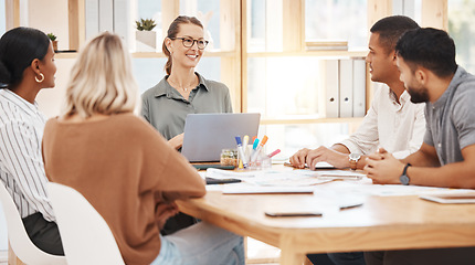 Image showing Laptop, meeting and collaboration with a business team in the boardroom for planning, strategy or brainstorming. Computer, teamwork and coaching with a group of colleagues talking in the office